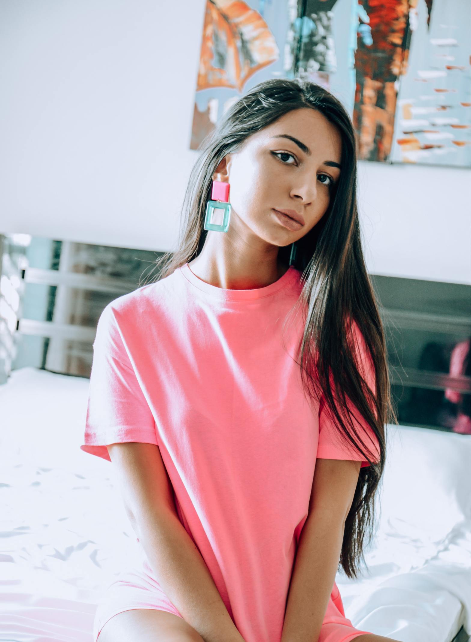 Girl in a plain pink shirt